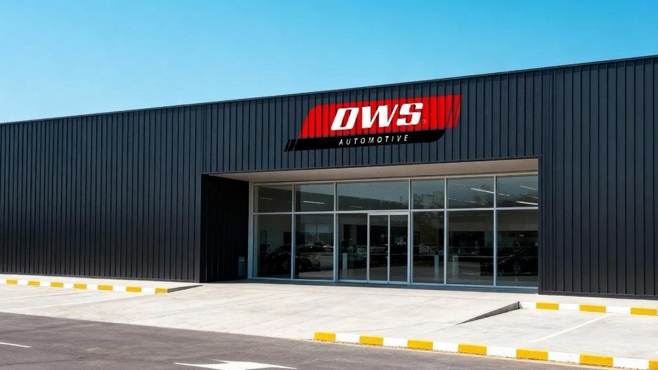OWS Auto black facility building with OWS logo